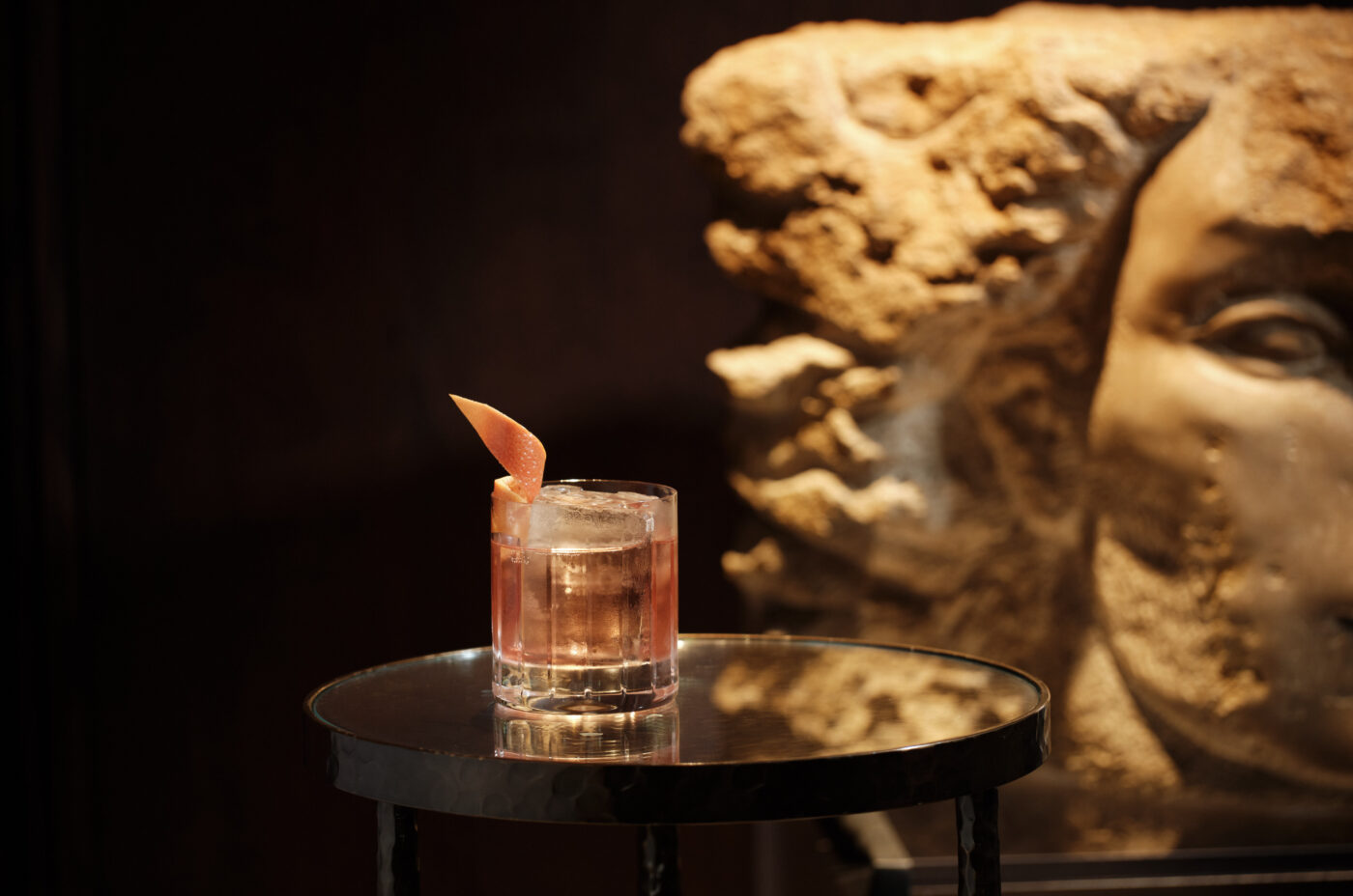 Gallery cocktail - Negroni cocktail with an orange garnish served at One Aldwych near Covent Garden.